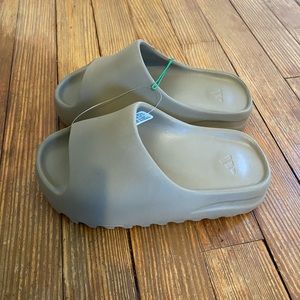 Womens Yeezy slides, brand new size 5.